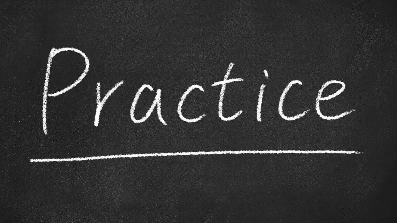 Practice written on a chalkboard, referring to improving poker skills.