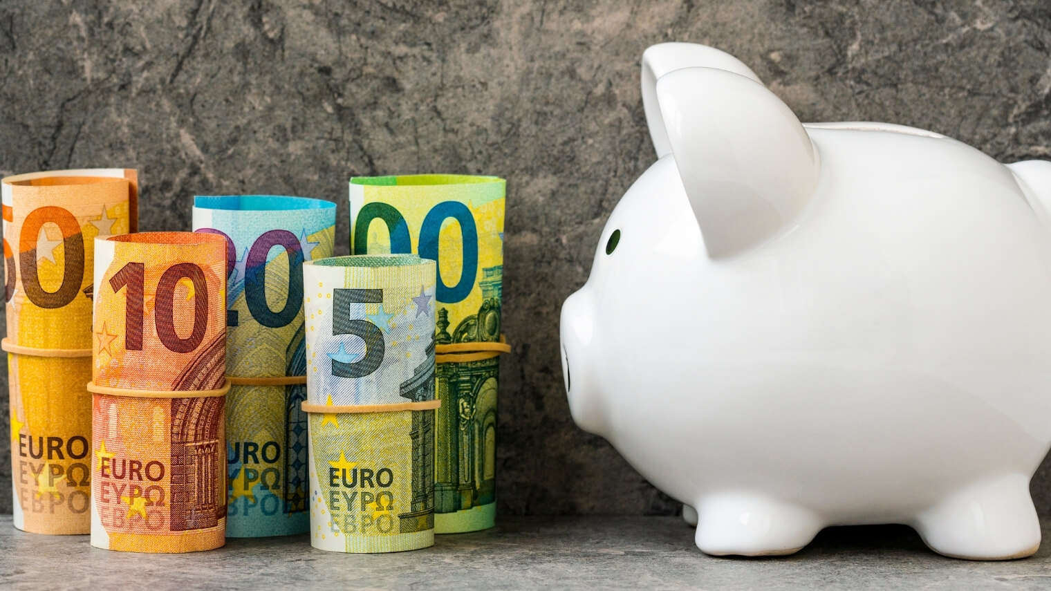 Piggy bank with euro bills, poker bankroll management.